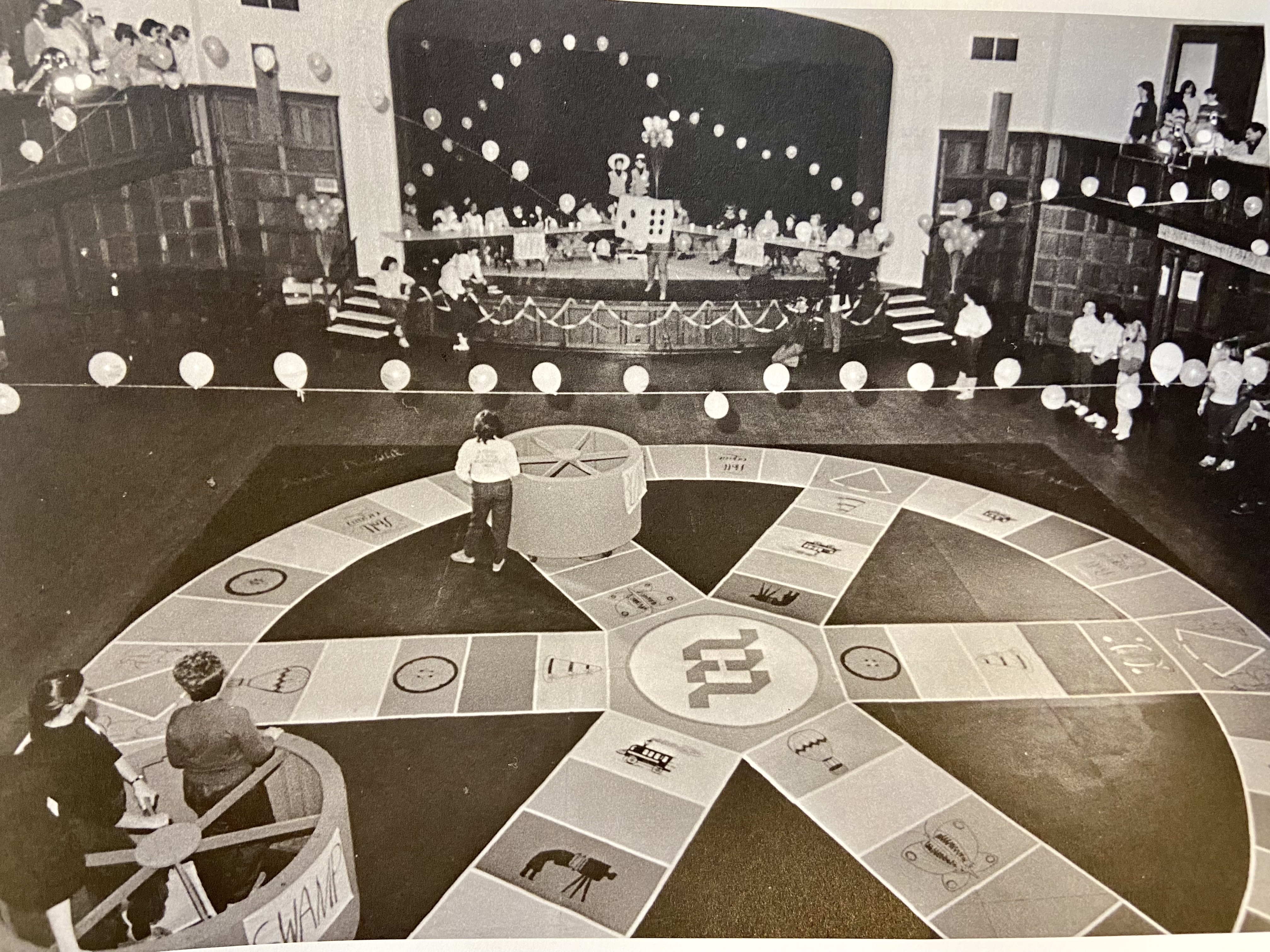 black and white image of large Trivial Pursuit game board built by students during J-term.