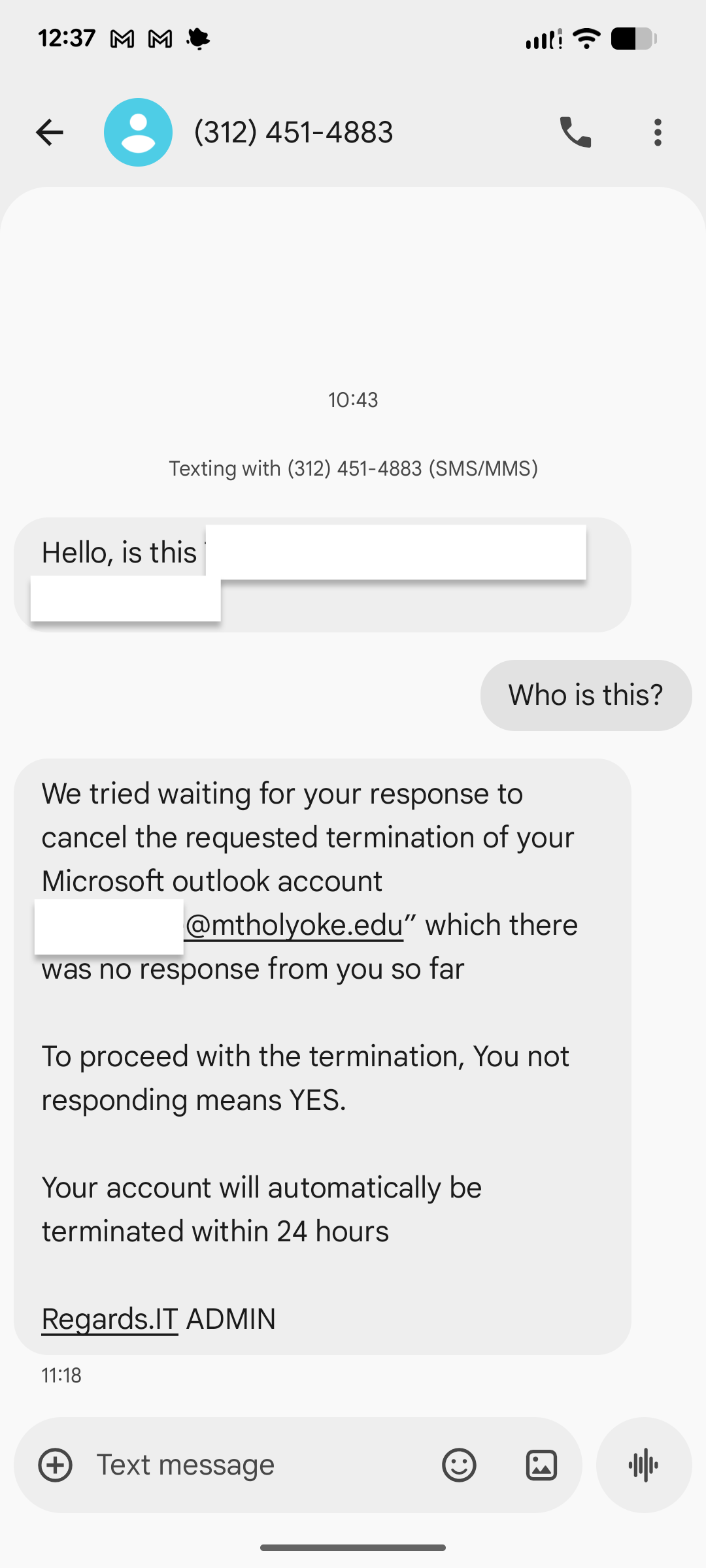 Screenshot of phishing text message with person's name and username redacted. 