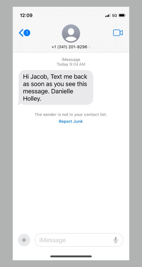 screenshot of phishing text message impersonating president holley