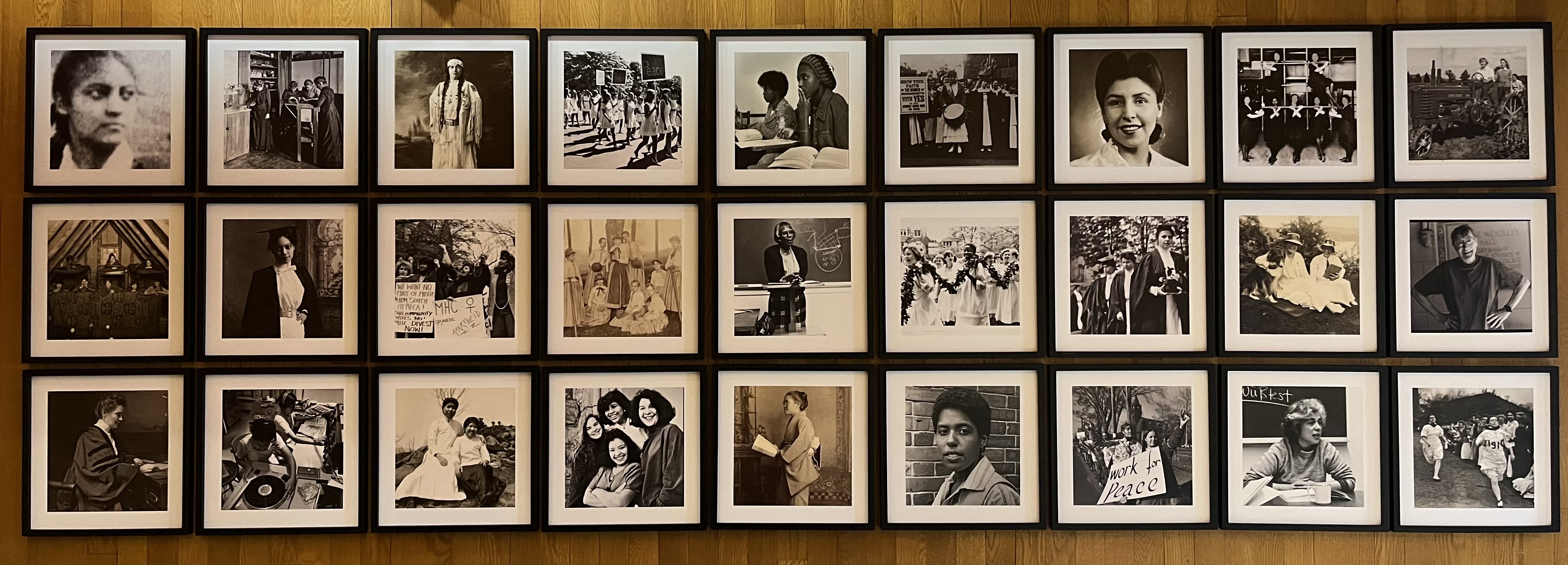 A wall of framed photos from Archives and Special Collections